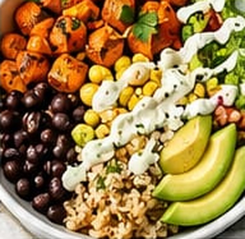 Roasted Sweet Potato & Black Bean Grain Bowl, shown as a serving suggestion
